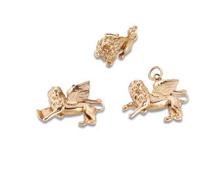 Three lion pendants