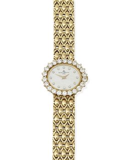A Baume & Mercier diamond and mother-of pearl wristwatch
