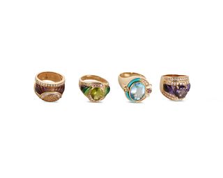 A group of four diamond and gem-set inlay rings