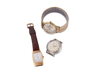 Group of three wristwatches
