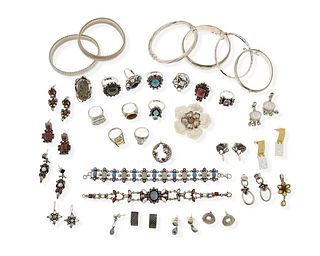 A large mixed group of silver jewelry
