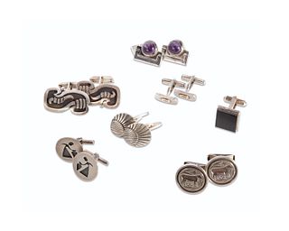 A mixed group of silver cufflinks