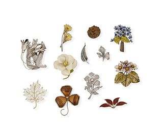A group of floral and botanical jewelry