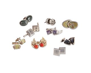 A large group of silver and stone-set cufflinks
