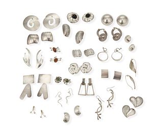 A large group of Modernist-style earrings