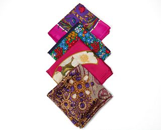 A group of designer silk scarves