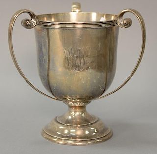 Sterling silver three handled loving cup, monogrammed. ht. 8 1/2 in.; 32 t oz.