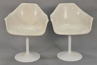 Pair of tulip style armchairs.