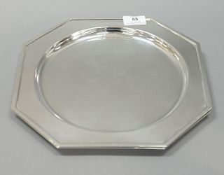 Set of nine silverplated service plates. dia. 11 1/2 in.