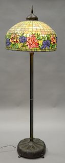 Reproduction Tiffany leaded floor lamp on bronze base. tota. ht. 77 in.; shade dia. 26 in.