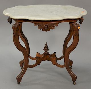 Victorian shaped marble top table. ht. 29 in.; top: 24" x 33"