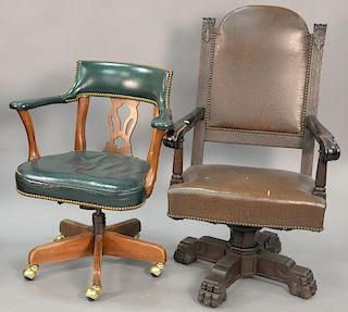 Two swivel office armchairs.
