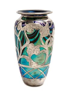 * A Loetz Glass and Silver Phanomen Genre Overlay Vase, Height 7 3/4 inches.