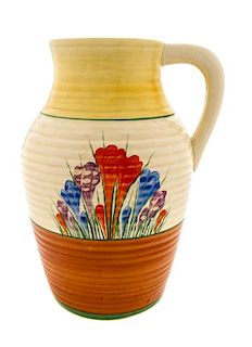 A Clarice Cliff Bizarre Ware Pottery Lotus Jug, Height 12 inches.
