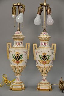 Pair of French porcelain hand painted urns made into table lamps. urn ht. 18 in.