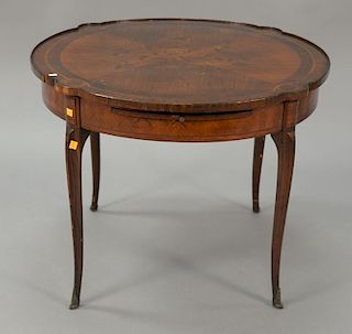 French round side table having blossoming flower inlaid top and pull out sides. ht. 24 in.; dia. 31 in.