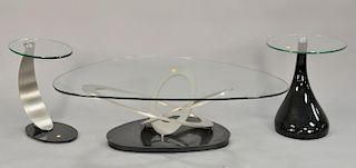 Three contemporary tables with glass tops including coffee table and two side stands. coffee: 52" x 34"