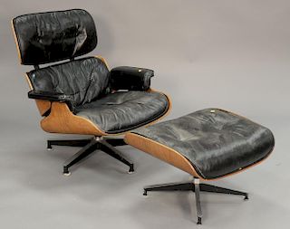 Eames teak lounge and ottoman (stool repaired).