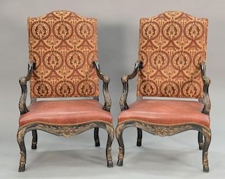 Pair of large Contemporary armchairs with leather seats.