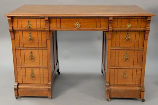 Eastlake Victorian walnut kneehole desk. ht. 31 in.; top: 26" x 48"