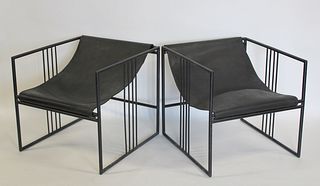 A Pair Of Patinated Metal Rebar Style Arm Chairs