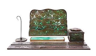 A Tiffany Studios Patinated Bronze Six-Piece Desk Set, Height of tallest 8 1/2 inches.