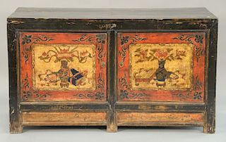 Early large Oriental painted two door cabinet (remade doors). ht. 35 in.; top: 25" x 60".
