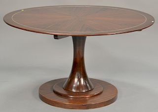 Rosewood banded table. ht. 30 in.; dia. 54 in.