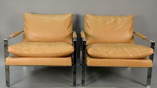 Pair of Milo Baughman chrome club chairs (chrome pitting).
