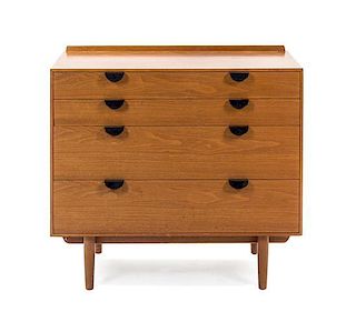 * A Finn Juhl Walnut Chest of Drawers, for Baker, Height 33 x width 36 x depth 18 inches.