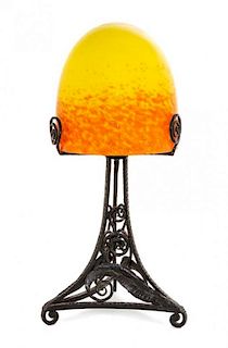 A French Wrought Iron and Mottled Glass Table Lamp, Height 16 1/2 inches.