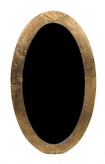 An Arts and Crafts Copper Clad Mirror, Height 39 x width 22 3/4 inches.