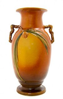 * A Roseville Pottery Vase, Height 18 3/8 inches.