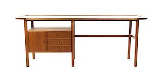 * A Walnut and Laminate Desk, Height 29 1/2 x width 78 x depth 22 inches.