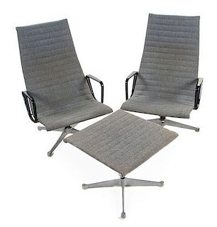 Two Charles and Ray Eames Aluminum Group Lounge Chairs and Ottoman, for Herman Miller, Height 39 3/4 inches.