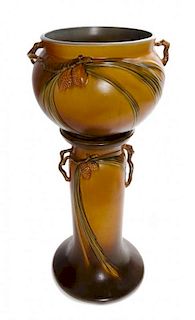 * A Roseville Pottery Jardiniere and Pedestal, Height overall 25 inches.