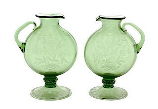 A Pair of Steuben Glass Ewers, Height 9 1/2 inches.