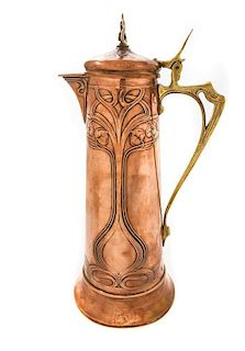 * A WMF Art Nouveau Brass and Copper Ewer, Height 17 1/4 inches.