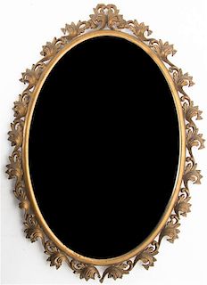 A Neoclassical Gilt Metal Mirror, Height 24 x width 17 inches.
