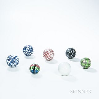 Seven Glazed Ceramic Carpet Balls