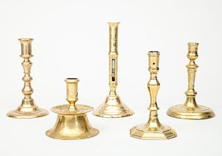 Dutch Baroque Brass Candlestick and Four Other Brass Candlesticks