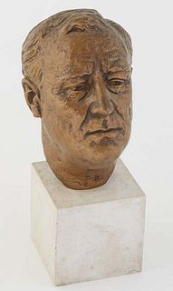 Jo Davidson (1883-1952), "Franklin Roosevelt," 1934, patinated plaster bust, presented on a white marble plinth, Bust- H.- 6 1/2 in., W.- 4 in., D.- 6