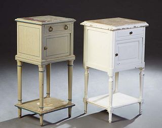 Two French Polychromed Carved Mahogany Marble Top Nightstands, early 20th c., one with a stepped edge top with an inset violet marble over a frieze dr