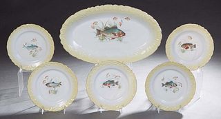 Carlsbad China Six Piece Fish Set, early 20th c., Austria, consisting of five plates and an oval platter, with pale yellow banding, Platter- H.- 2 in.
