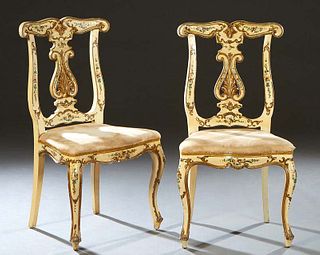 Pair of French Louis XV Style Gilt and Paint Decorated Side Chairs, late 19th c., the serpentine crest rail over a pierced vertical splat flanked by c