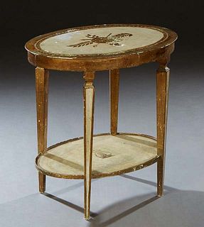 Italian Polychromed and Gilt Decorated Side Table, late 19th c., the oval top with incised decoration, on square tapered legs joined by a lower stretc