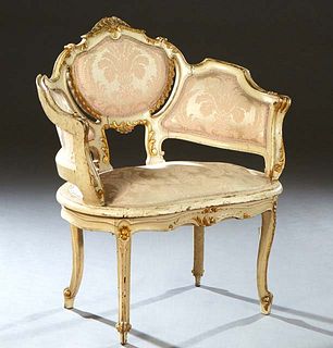 Painted French Louis XV Style Polychromed Fauteuil, 20th c., with gilt and floral decoration, the curved three cushioned back and arms over an oval cu