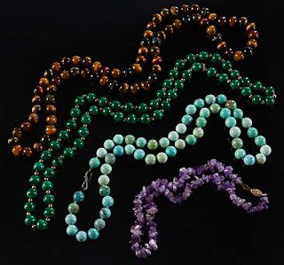 Group of Four Stone Bead Necklaces, one of 10mm tiger's eye beads, L.- 30 in; a strand of 10mm malachite beads separated by yellow gold beads, L.- 28 