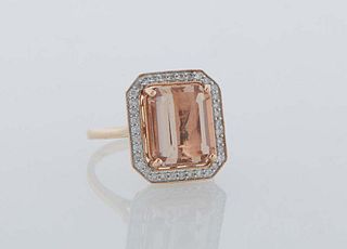 Lady's 14K Rose Gold Dinner Ring, with a 6.21 carat emerald cut morganite atop an octagonal border of small round diamonds, total diamond weight- .3 c