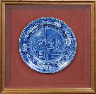 Continental Blue and White Porcelain Plate, 18th c., depicting a man and woman with a telescope and a man falling down stairs, presented in a gilt sha